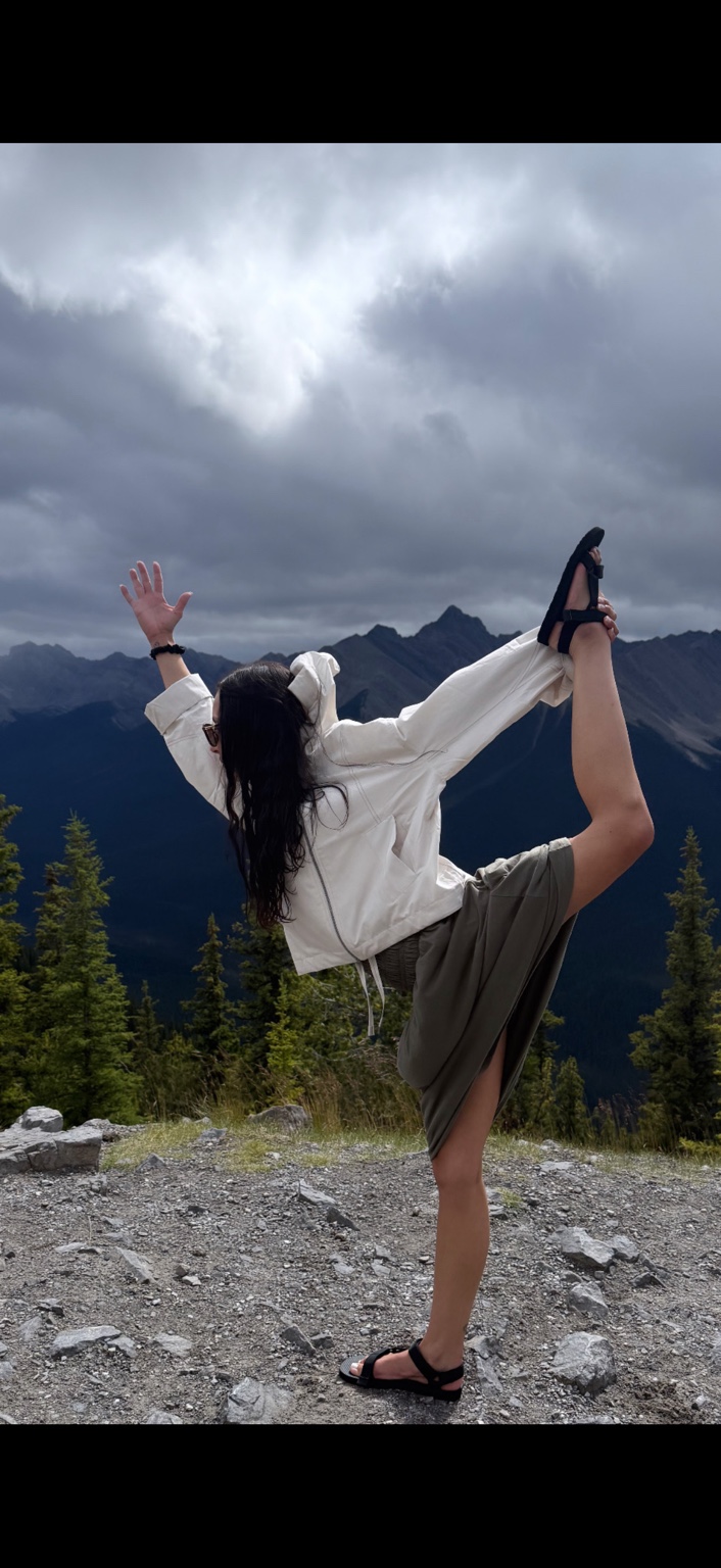 Julia practicing yoga in the mountains